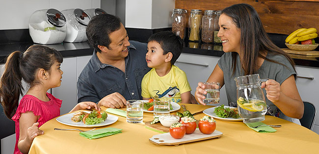 family is having healthy lunch